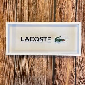 Lacoste brand placard